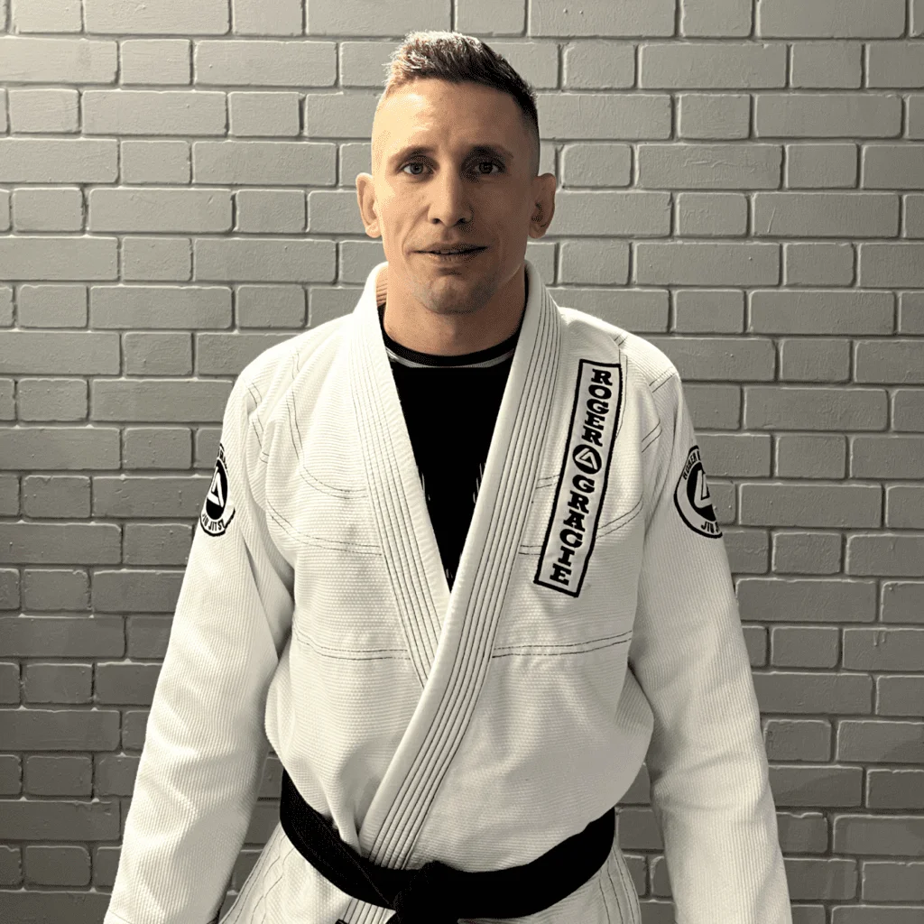 Black belt assistant coach Adrian.